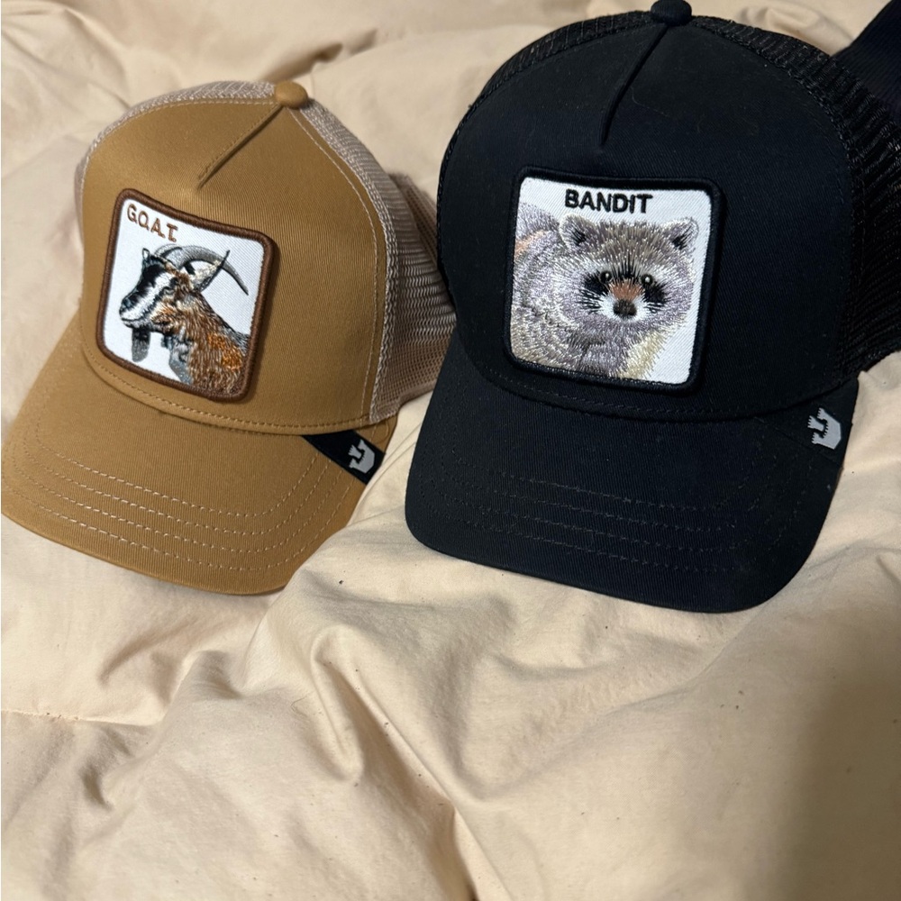 The Farm racoon and goat SnapBack hats
